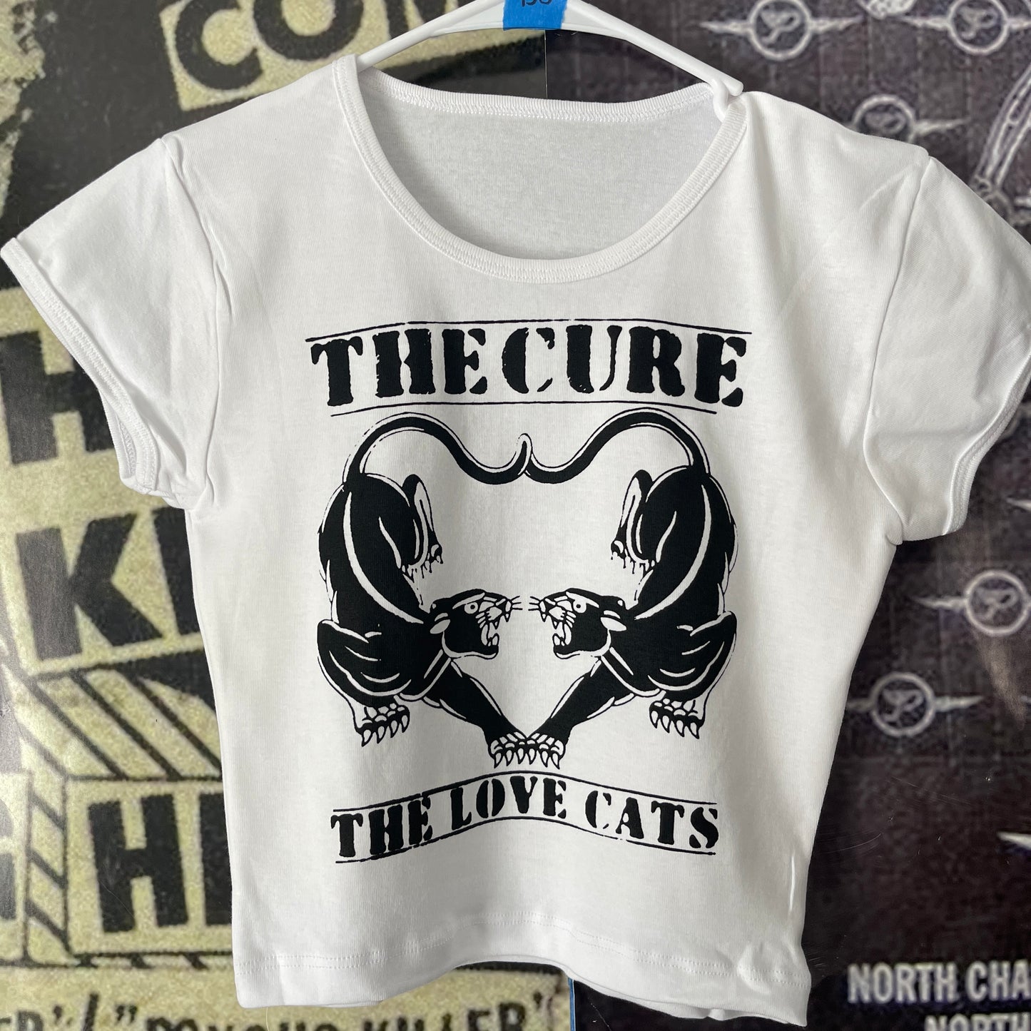 The cure white crop baby tee